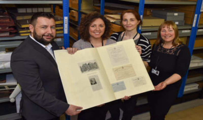 Cllr Anthony Burns (left) with library staff at the Gamble Archives