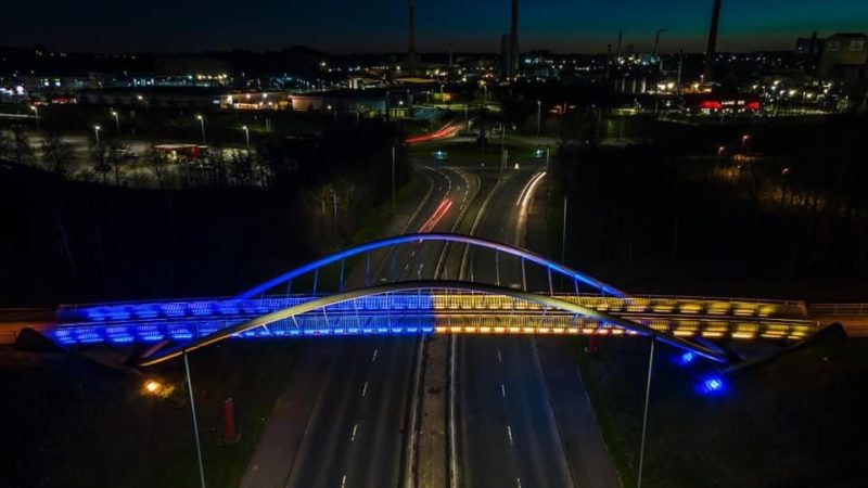 The Steve Prescot Bridge lit blue and yellow this weekend