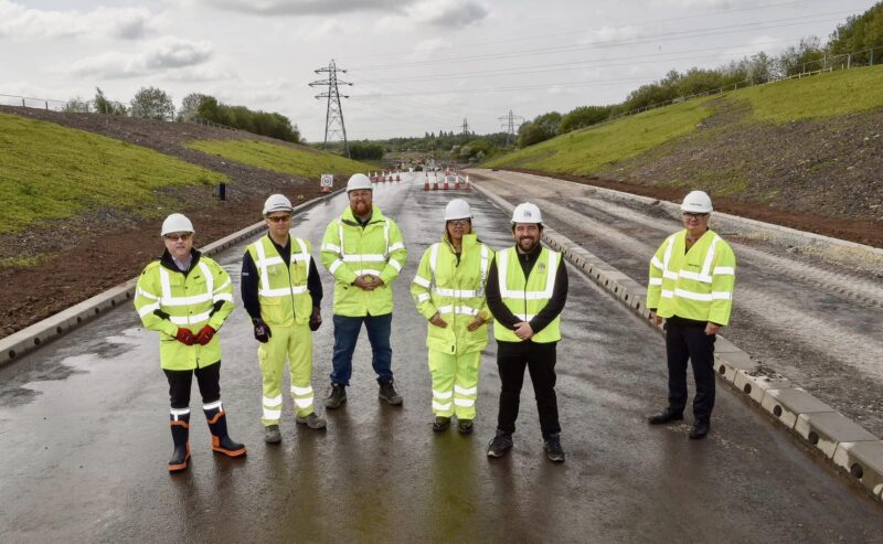 Cllr Baines, Deputy Leader Cllr Gomez-Aspron and Cllr Andy Bowden with staff at the Parkside Link Road site